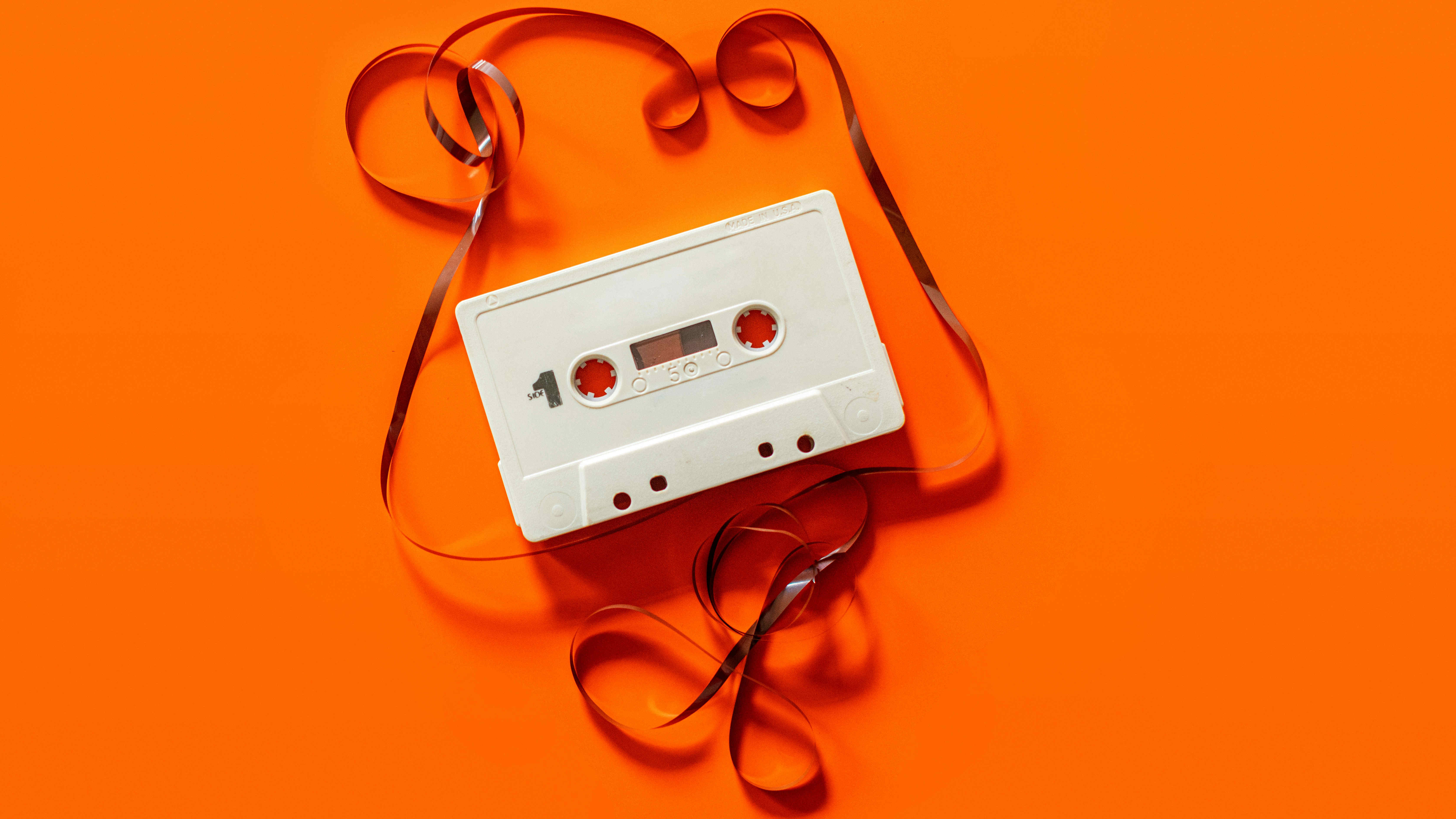 White audio cassette with pulled tape